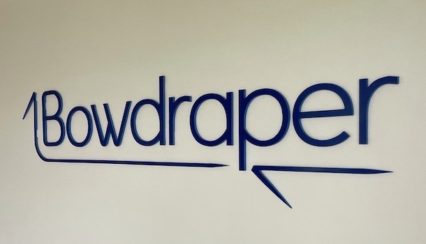 Bowdraper logo on a wall